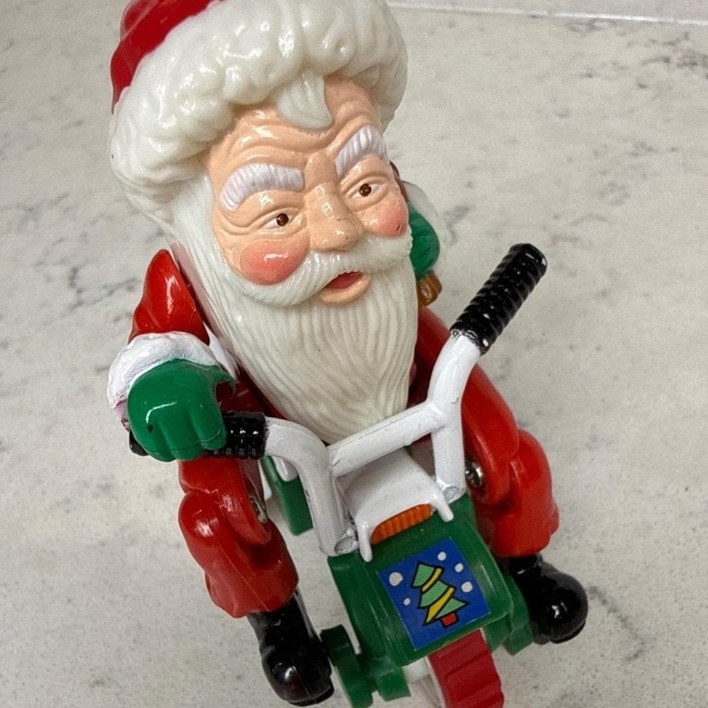 Naughty Santa Claus Riding Tricycle Christmas Holiday Decoration Toy Figurine